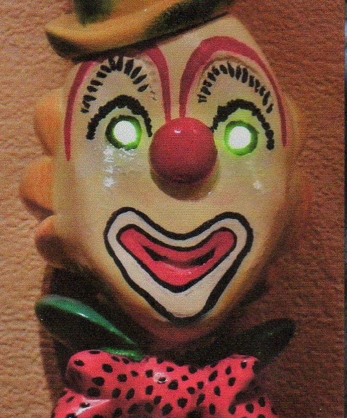 A - Clown with lit up eyes