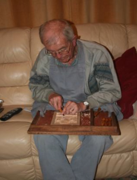 John Pryke busy with his carving of the Kent White Horse